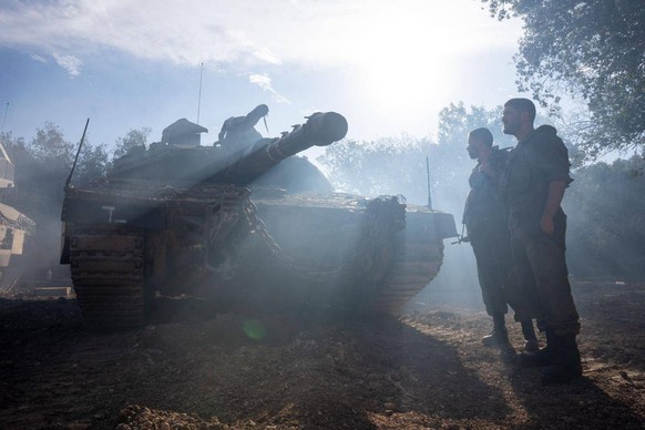 241207 -- GOLAN HEIGHTS, Dec. 7, 2024 -- This photo released by on Dec. 6, 2024 shows Israeli troops stationed in the Israeli-occupied Golan Heights. The IDF reinforced its presence in the Israeli-ann ...