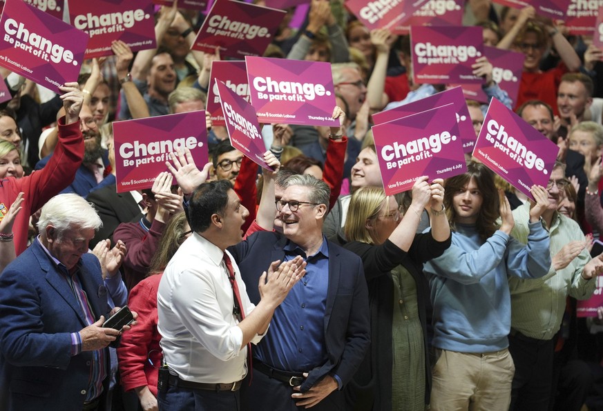 Britain&#039;s Labour Party leader Sir Keir Starmer, center, reacts after giving a speech during a visit to the Caledonian Gladiators Stadium in East Kilbride, Scotland, Wednesday July 3, 2024, while  ...