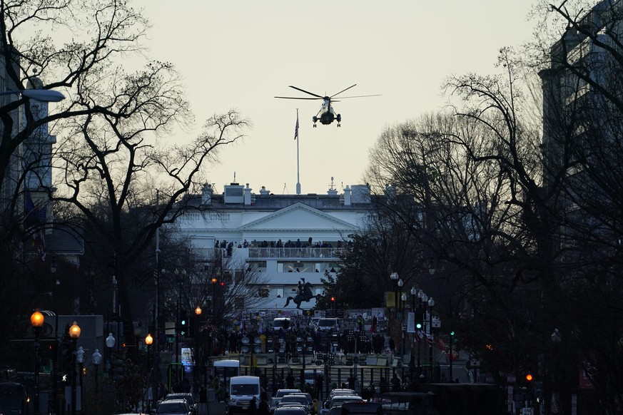 Marine-One carrying President Donald Trump and Melania Trump departs the White House ahead of President-elect Joe Biden&#039;s inauguration ceremony, Wednesday, Jan. 20, 2021, in Washington. (AP Photo ...