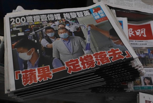 August 11, 2020, Hong Kong, CHINA: Stuck of APPLE DAILY, a front page reporting the arrest of their founder and chairman Jimmy Lai is on sale at local newspaper stand this morning. On the front page i ...