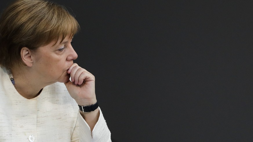 German Chancellor Angela Merkel attends a budget debate at the German parliament, Bundestag, at the Reichstag building in Berlin, Germany, Tuesday, July 3, 2018. (AP Photo/Markus Schreiber)