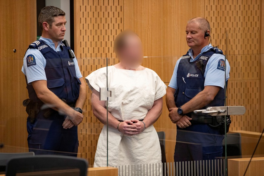 FILE PHOTO: Brenton Tarrant, charged for murder in relation to the mosque attacks, is seen in the dock during his appearance in the Christchurch District Court, New Zealand March 16, 2019. Mark Mitche ...