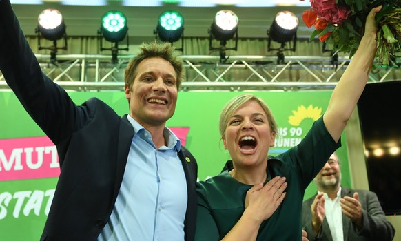 Katharina Schulze and Ludwig Hartmann top candidates of the Green Party react after the announcement of first exit polls in the Bavarian state elections in Munich, Germany, October 14, 2018. REUTERS/A ...
