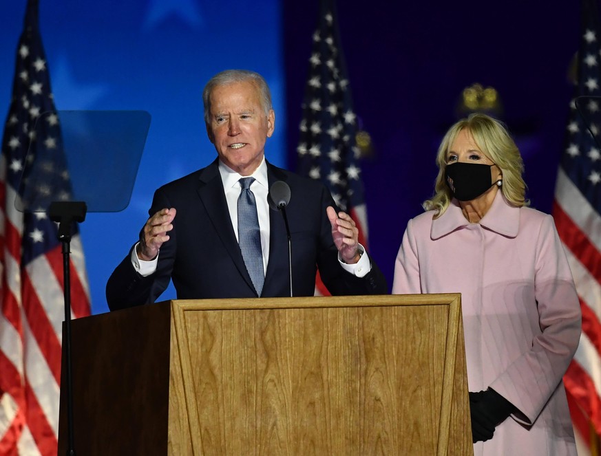 Former Vice President Joe Biden speaks to supporters at a parking lot in Wilmington, Delaware on Tuesday, November 3, 2020. Biden expressed optimism and said it will take time to count the votes in cr ...