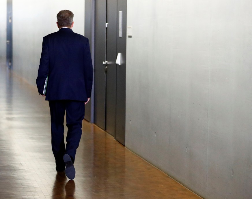 Hans-Georg Maassen, President of the Federal Office for the Protection of the Constitution arrives for a meeting of the parliamentary committee that oversees German intelligence agencies, in Berlin, G ...