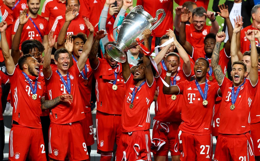 FOOTBALL : Paris Saint Germain vs Bayern Munich - Finale - UEFA Ligue des Champions - 23/08/2020 LISBON, PORTUGAL - AUGUST 23: Kingsley Coman of FC Bayern Munich lifts the UEFA Champions League Trophy ...