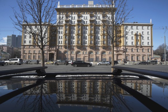 The U.S. Embassy is reflected in a car in Moscow, Russia, Thursday, March 29, 2018. Britain has accused Russia of a nerve agent attack on ex-spy Sergei Skripal and his daughter, the accusations Russia ...