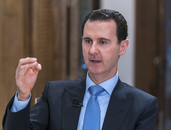 In this photo released on Wednesday, June 13, 2018 by the Syrian official news agency SANA, Syrian President Bashar Assad speaks during an interview with Iran&#039;s Al Alam TV, in Damascus, Syria. As ...