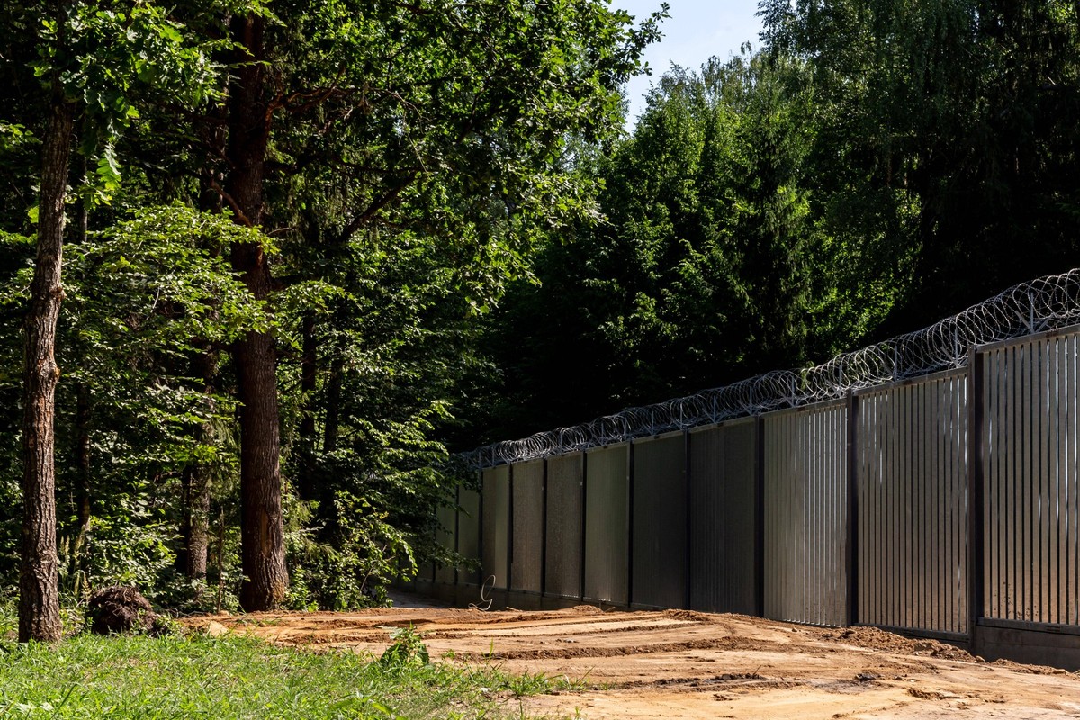 Bialowieza Wilderness In Poland Cut By Border Barrier The physical steel barrier between Poland and Belarus is seen in the middle of Bialowieza Forest on July 1, 2022 in Bialowieza, Poland. The Polish ...