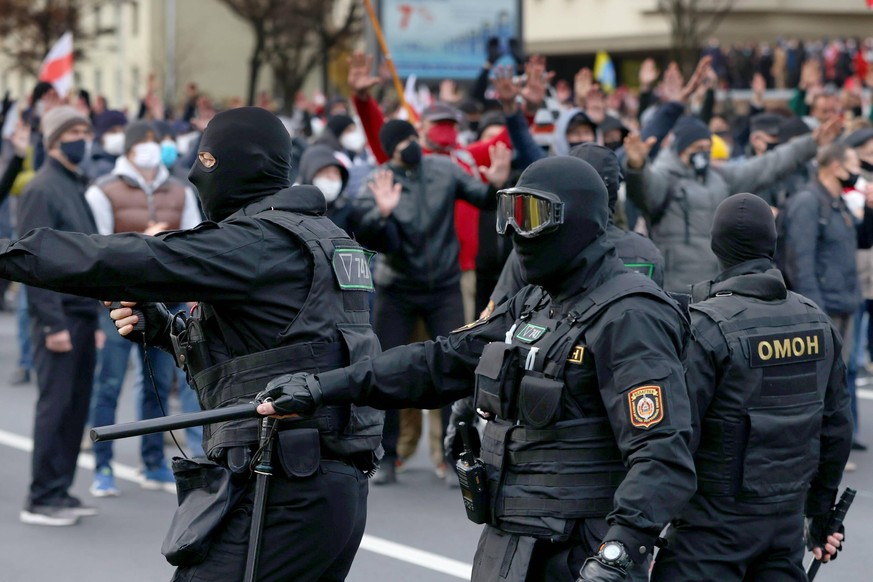 MINSK, BELARUS - NOVEMBER 1, 2020: Riot police officers are seen in Independence Avenue during the Dziady opposition march. The annual march is held by the Belarusian opposition from central Minsk to  ...