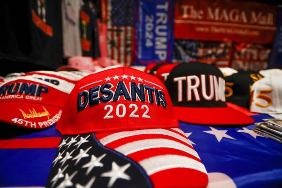 July 22, 2022, Tampa, Florida, USA: Hats and flags being sold in support of Gov. Ron DeSantis and former President Donald Trump seen at Turning Point s annual Student Action Summit at the Tampa Conevn ...