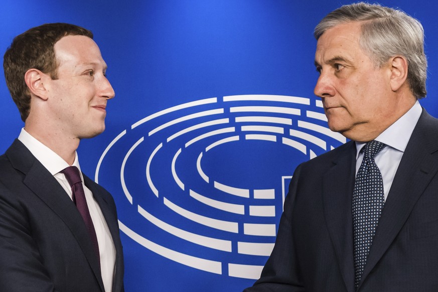 European Parliament President Antonio Tajani, right, welcomes Facebook CEO Mark Zuckerberg upon his arrival at the EU Parliament in Brussels on Tuesday, May 22, 2018. European Parliament President Ant ...