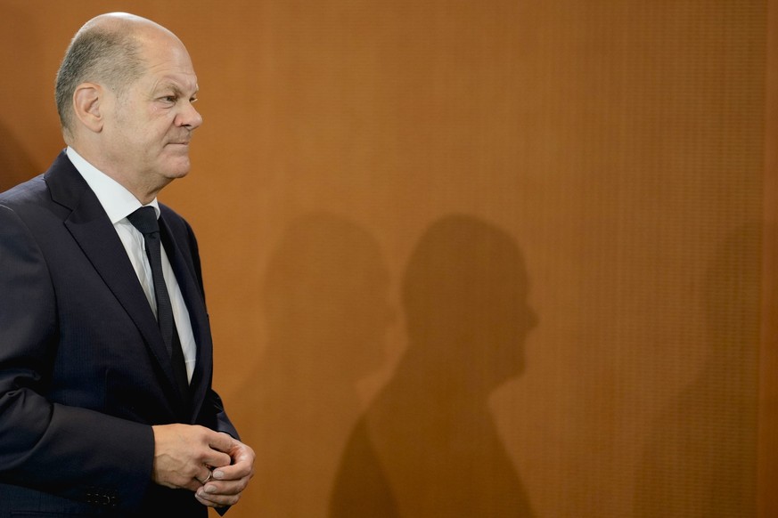 German Chancellor Olaf Scholz arrives for a cabinet meeting at the chancellery in Berlin, Germany, Wednesday, Sept. 13, 2023. (AP Photo/Markus Schreiber)