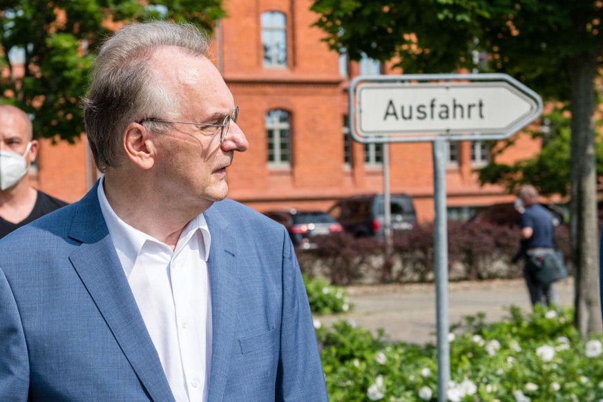 MAGDEBURG, GERMANY - JUNE 06: Reiner Haseloff, German Christian Democrat (CDU) premier of Saxony-Anhalt, reacts after he casts the ballots in Saxony-Anhalt state elections on June 6, 2021 in Wittenber ...