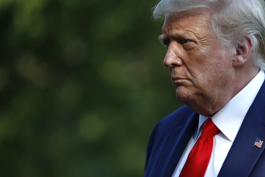 President Donald Trump walks on the South Lawn of the White House in Washington, Wednesday, July 15, 2020, after stepping off Marine One. Trump is returning from Atlanta. (AP Photo/Patrick Semansky)