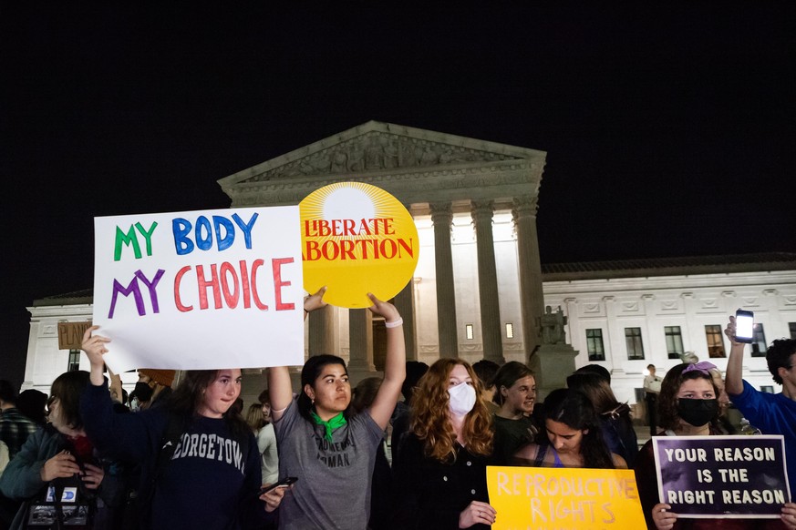 Pro-choice activists rally at the Supreme Court just hours after Politico reported that Supreme Court justices had voted to overturn Roe v. Wade. In a draft opinion for the Dobbs v. JWHO case. Jackson ...