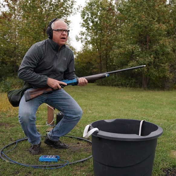 September 25, 2018, Le Sueur, Minnesota, USA: Gubernatorial candidate TIM WALZ watched a clay target sailed just out reach of his shot on the sporting clay course at the Caribou Gun Club in Le Sueur,  ...