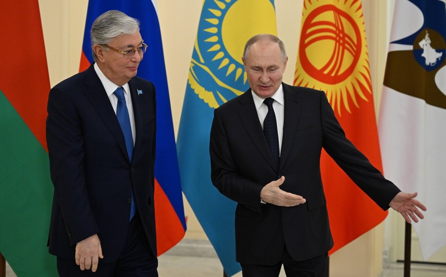 Russia Putin EAEU Council 8589318 25.12.2023 Russian President Vladimir Putin and Kazakh President Kassym-Jomart Tokayev attend a meeting of the Supreme Eurasian Economic Council in St. Petersburg, Ru ...