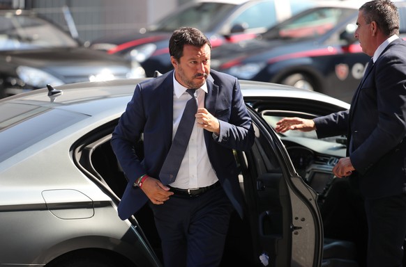 Italian Interior Minister Matteo Salvini arrives before the state funeral of the victims of the Morandi Bridge collapse, at the Genoa Trade Fair and Exhibition Centre in Genoa, Italy August 18, 2018. ...