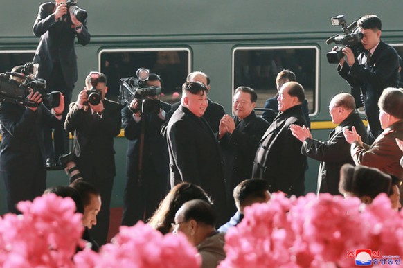 This image released on February 23, 2019, by the North Korean Official News Service (KCNA), shows North Korean leader Kim Jong Un as he departed by train en route to his second summit with U.S. Presid ...
