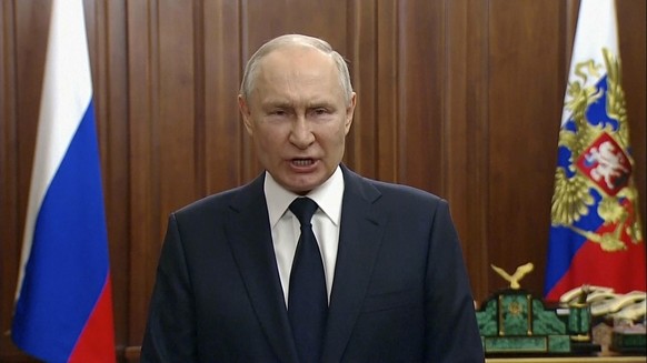 In this photo taken from video, Russian President Vladimir Putin delivers his address to the nation in Moscow, Russia, Monday, June 26, 2023. (Russian Presidential Press Service via AP)