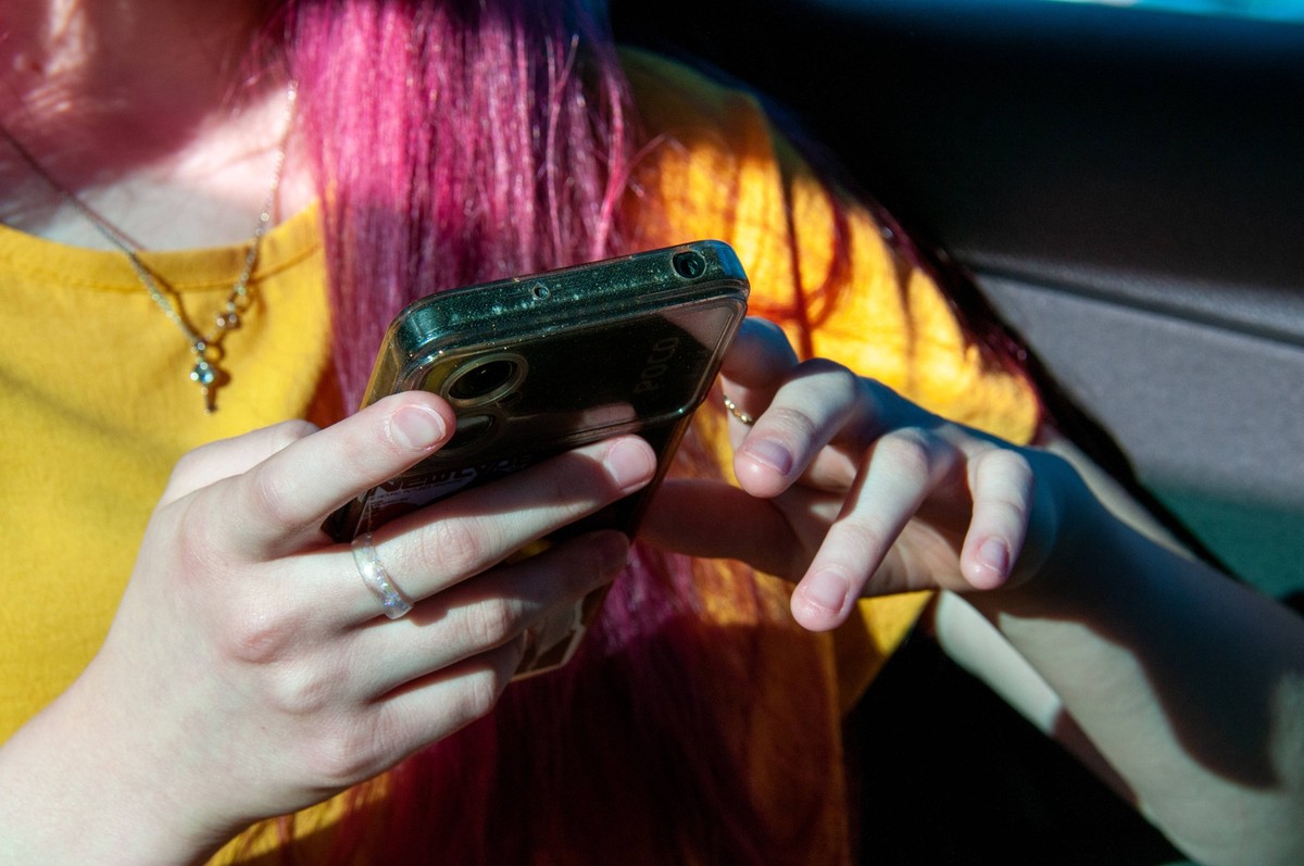 The girl with the phone A girl with a smartphone in her hands Samara Samara region Russia Copyright: xSvetlanaxVozmilovax Vozmilova5512