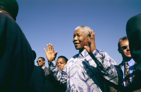 NELSON ROLIHLAHLA MANDELA (July 18, 1918 - December 5, 2013), 95, world renown civil rights activist and world leader. Mandela emerged from prison to become the first black President of South Africa i ...