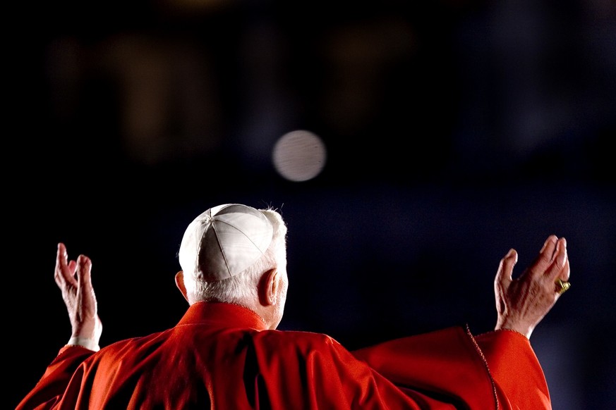 Pope Benedict XVI leads his first Via Crucis, way of the Cross, part of the solemn celebrations of Easter's Holy Week at the Roman Colisseum in central Rome. (Photo by Alessandra Benedetti/Corbis via  ...