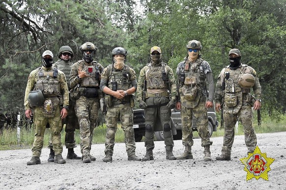 FILE - In this photo released by Belarus&#039; Defense Ministry on Thursday, July 20, 2023, Belarusian soldiers of the Special Operations Forces (SOF) and mercenary fighters from Wagner private milita ...
