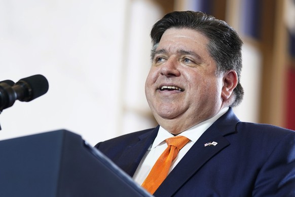 FILE - Illinois Gov. J.B. Pritzker addresses the crowd at the Old Post Office, June 28, 2023, in Chicago. On Wednesday, July 10, 2024, Pritzker signed into law measures to block what he called insuran ...