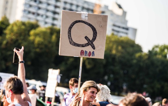September 12, 2020, Munich, Bavaria, Germany: One of numerous QAnon signs at the Querdenken089 demo. These participants were not asked to leave, nor denounced. The Querdenken Conspirituality group tha ...