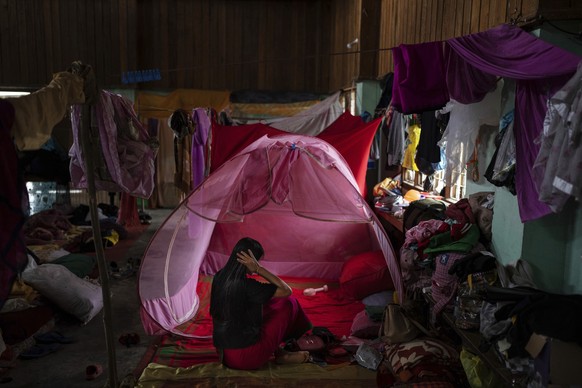 A displaced person from the Meitei community lives in a relief camp in Moirang, near Imphal, capital of the northeastern Indian state of Manipur, Wednesday, Jun 21, 2023. (AP Photo/Altaf Qadri)