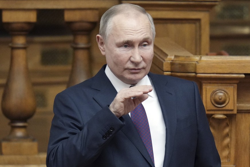 Russian President Vladimir Putin delivers a speech during а meeting of the Council of Legislators under the Russian Federal Assembly in St. Petersburg, Russia, Friday, April 28, 2023. (Alexei Danichev ...