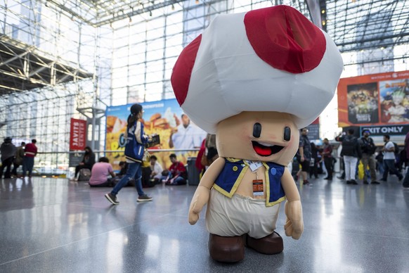 An attendee dressed as Toad from Super Mario poses during New York Comic Con at the Jacob K. Javits Convention Center on Thursday, Oct. 12, 2023, in New York. (Photo by Charles Sykes/Invision/AP)