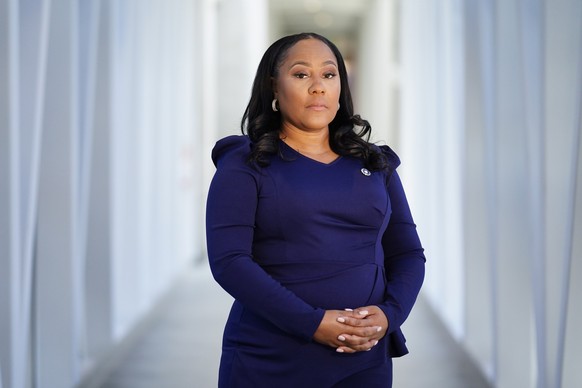 Fulton County District Attorney Fani Willis poses for a portrait, Wednesday, April 19, 2023, in Atlanta. (AP Photo/Brynn Anderson)