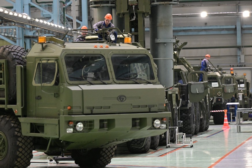 FILE - Employees of the Almaz-Antey Corporation&#039;s Obukhov Plant work at its assembly shop in St. Petersburg, Russia, on Jan. 18, 2023. After a year of far-reaching sanctions aimed at degrading Mo ...