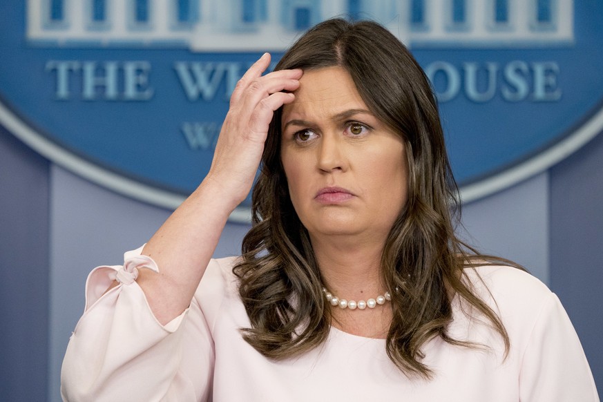 White House press secretary Sarah Huckabee Sanders listens to a question during the daily press briefing at the White House, Monday, June 4, 2018, in Washington. Sanders discussed, Trump's pardon powe ...