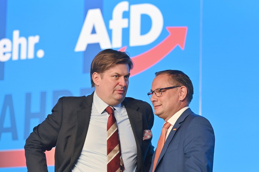 v.li:EU Abgeordneter Maximilian KRAH, Tino CHRUPALLA Bundessprecher vor Logo. 14.Bundesparteitag der AfD Alternative fuer Deutschland am 28.07.2023 in der Messe Magdeburg *** v li EU Member of Parliam ...