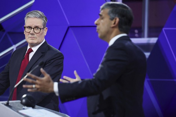 FILE - Britain&#039;s Prime Minister Rishi Sunak and opposition Labour Party leader Keir Starmer, left, take part for the BBC&#039;s Prime Ministerial Debate, in Nottingham, England, on June 26, 2024. ...