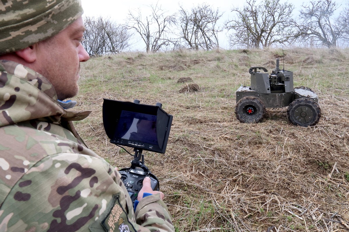 A serviceman controls a Liut Rage combat ground robotic complex during the training of operators of ground robotic systems and other specialists for the Ukrainian Ground Forces, April 16, 2025. Photo  ...