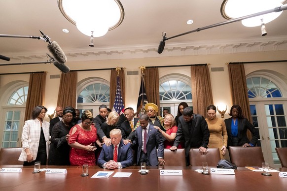 February 27, 2020, Washington, DC, United States of America: U.S President Donald Trump participates in a prayer with African American Leaders and Pastor Paula White in the Cabinet Room of the White H ...