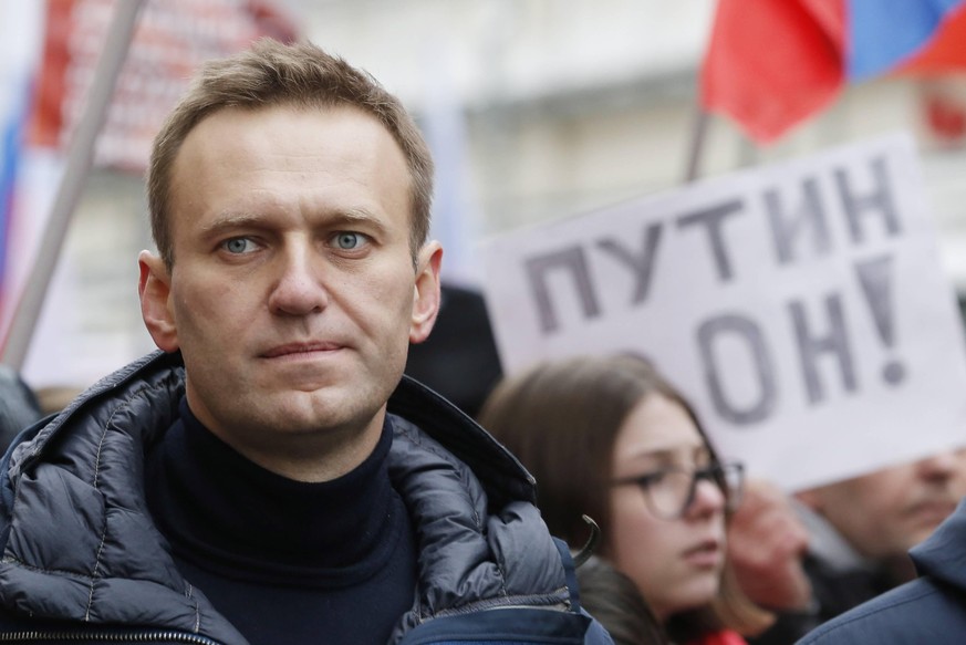 MOSCOW, RUSSIA - FEBRUARY 24, 2019: Opposition activist Alexei Navalny takes part in the 4th annual rally to mark the 4th anniversary of the assassination of opposition politician Boris Nemtsov in cen ...