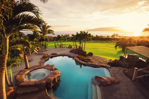 luxury home with swimming pool at sunset xkwx back-yard, beautiful, dusk, family, for-sale, garden, gate, hawaii, high-class, home, house, landscaped, lawn, lifestyles, lights, luxury, mansion, modern ...