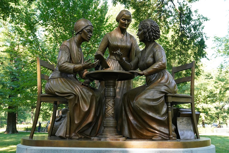 A bronze statue depicting Sojourner Truth, Elizabeth Cady Stanton and Susan B. Anthony is pictured following the 100th anniversary of the ratification of the 19th Amendment in Central Park in the Manh ...