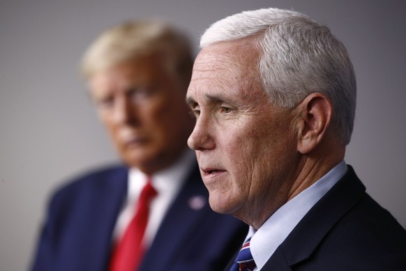 FILE - Vice President Mike Pence speaks alongside President Donald Trump during a coronavirus task force briefing at the White House in Washington on March 22, 2020. Former Vice President Mike Pence i ...