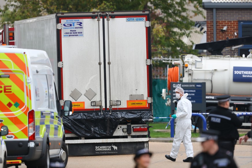 Bodies found in lorry container. Police forensics officers at the Waterglade Industrial Park in Grays, Essex, after 39 bodies were found inside a lorry on the industrial estate. Picture date: Wednesda ...
