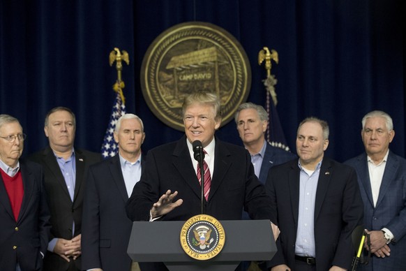 FILE - President Donald Trump, center, accompanied by from left, Senate Majority Leader Mitch McConnell of Ky., Vice President Mike Pence, House Majority Leader Kevin McCarthy of Calif., House Majorit ...