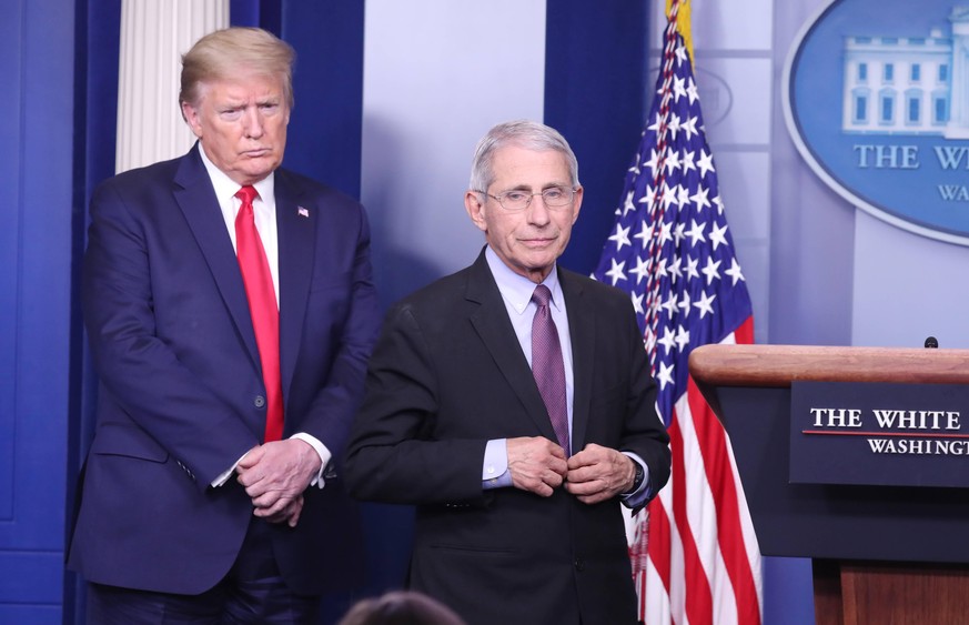 US President Donald J. Trump L and Anthony Fauci, Director of the National Institute of Allergy and Infectious Diseases, are joined by members of the Coronavirus Task Force to deliver remarks on the C ...