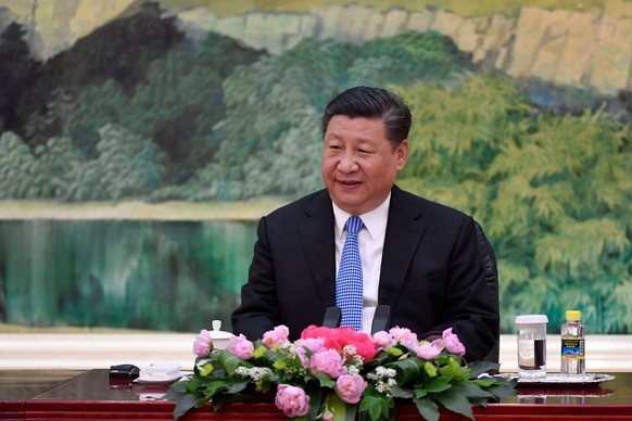 BEIJING, CHINA - APRIL 22: Chinese President Xi Jinping speaks to heads of the delegation of SCO (not pictured) during a meeting at the Great Hall of the People on April 23, 2018 in Beijing, China. (P ...