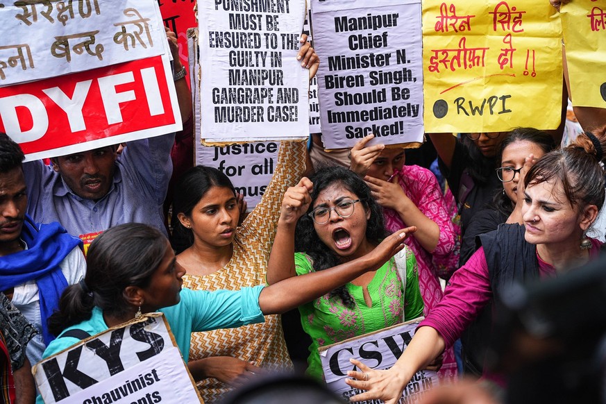 India: Manipur Protest Member of tribal communities and student organizations stage a protest following the release of a horrific film depicting the public humiliation and assault of two tribal women  ...
